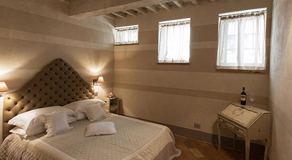 Le Bifore Cortona Rom bilde