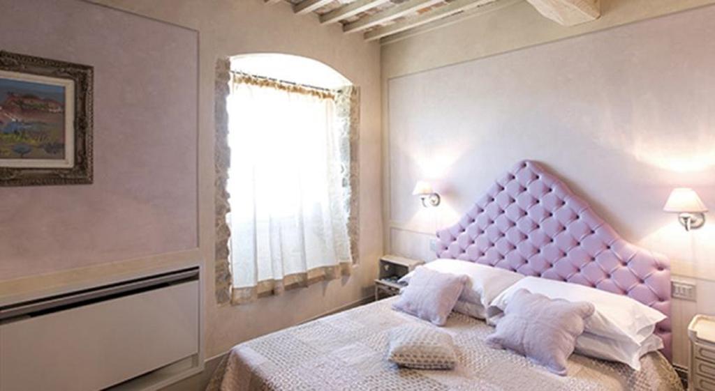 Le Bifore Cortona Rom bilde