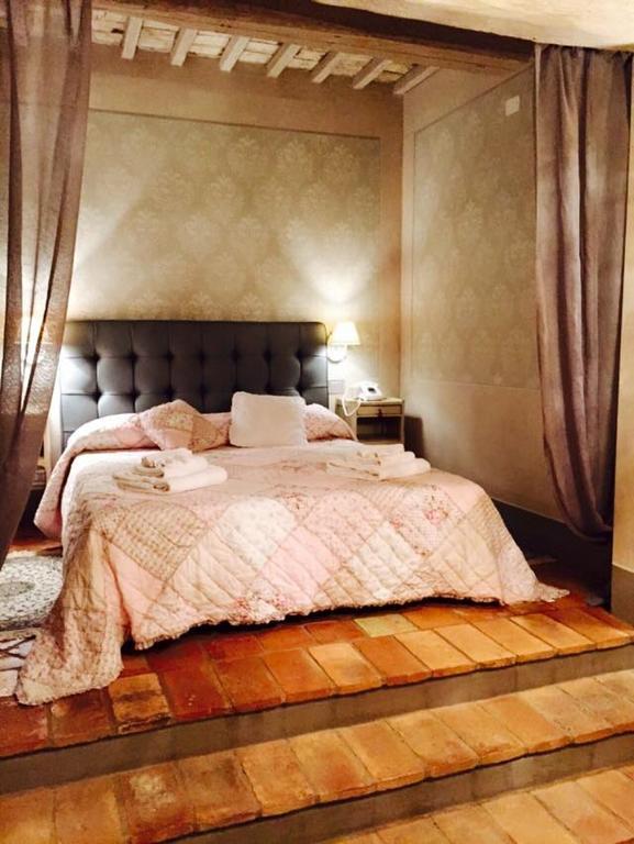 Le Bifore Cortona Rom bilde